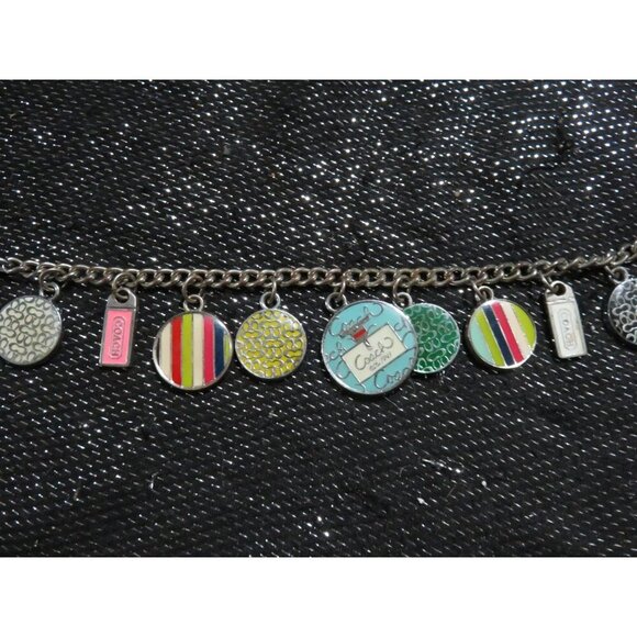 COACH VINTAGE JEWELRY SILVER 9 CHARMS 8 INCH BRACELET - Picture 1 of 6